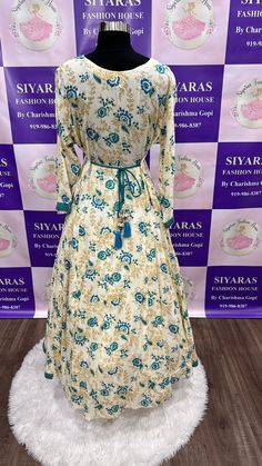 Lovely floral long gown. Fits size 42 to 43.Gown length is 51 Green Floral Print Gown, Fitted Floral Embroidery Long Gown, Elegant Ankle-length Maxi Dress For Wedding, Elegant Floral Print Anarkali Set For Wedding, Elegant Floral Anarkali Set For Wedding, Multicolor Floral Embroidered Floor-length Gown, Floor-length Floral Embroidered Gown, Elegant Floor-length Floral Lehenga, Festive Embroidered Maxi Dress