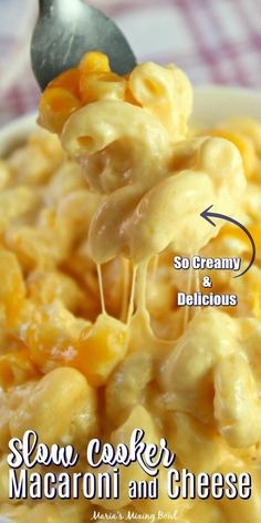 a spoon full of macaroni and cheese with the title above it that reads so creamy, delicious