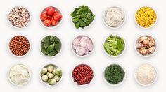 several bowls filled with different types of vegetables and grains on white background, top view