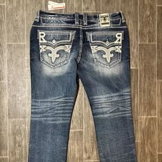 Brand New With Tags Mens 44 Actual Measurements Laying Flat Waist 22” Rise 12” Inseam 33” Rock Revival Jeans, Denim Color, Jeans Mens, Embroidered Denim, Rock Revival, Colored Denim, Straight Jeans, Mens Jeans, Man Shop