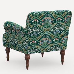 an upholstered chair with green floral fabric and wooden legs, viewed from the front