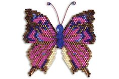 a colorful butterfly made out of beads on a white background