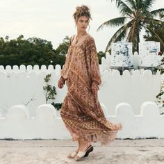 Lovers Beach Maxi Dress Flowy Brown Printed Maxi Dress, Brown Long Sleeve Boho Dress For The Beach, Long Sleeve Brown Boho Dress For The Beach, Fall Festival Brown Maxi Dress, Bohemian Beige Printed Maxi Dress, Bohemian Brown Boho Dress For Fall, Flowy Brown Boho Dress For The Beach, Bohemian Brown Printed Dresses, Beige Boho Dress For Fall Vacation