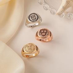 Celebrate your high school or College journey with a custom Signet Ring! Customize the university crest, class emblem, and other logo designs on the front of the ring. You can also engrave the year and other special words on the ring band, as well as add your name inside the ring. To create a one-of-a-kind piece that reflects your unique experience and will remind you of your  school experience for years to come.. Whether you're looking for a stylish accessory or a meaningful graduation Gifts, this personalized ring is the perfect way to commemorate your time in high school or college . This will be a perfect graduation gift! Our jewelry pieces come equipped with everything you need for gifting, a gift box included with every purchase at no additional cost. --How to Order-- [In Drop Down M Graduation Rings College, Meaningful Graduation Gifts, College Ring, Valentine Gift For Him, Graduation Ring, Graduation Gift For Him, College Rings, Custom Signet Ring, Gold Class