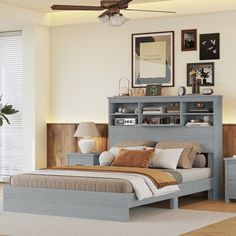 a bed room with a neatly made bed and a ceiling fan