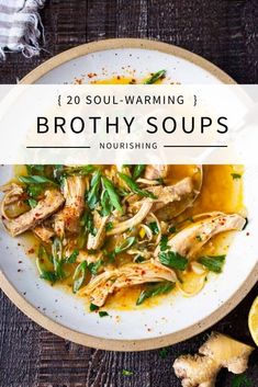 brothy soup in a white bowl with lemons and herbs on the side