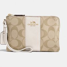 Nwt Coach Wristlet Corner Zip In Signature Canvas Signature Coated Canvas And Crossgrain Leather Two Credit Card Slots Zip-Top Closure, Fabric Lining Wrist Strap Attached 6 1/4" (L) X 4" (H) X 1/2" (W) Color: Gold/Khaki Saddle Elegant Handheld Clutch With Wrist Strap, Elegant White Clutch With Zipper Closure, Elegant Gold Coach Wristlet, Elegant Clutch With Wrist Strap, Elegant Handheld Wallet With Zipper Pouch, Elegant Pouch Wristlet For Daily Use, Elegant Handheld Wristlet With Removable Pouch, Elegant White Travel Pouch, Elegant Gold Rectangular Wristlet