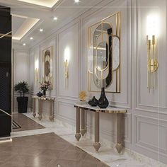 an elegant hallway with gold accents and mirrors