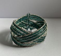 Up for sale is this Vintage Beaded Wide Cuff Bracelet Turquoise/Silver Stretch 1.5" Wide. It is in good condition, please see photos for details. Please let me know if you have any questions. Thanks for looking! Silver Beaded Cuff Bracelet, Silver Beaded Bangle Cuff Bracelet, Turquoise Beaded Cuff Bracelet Bangle, Wide Cuff Bracelets, Wide Cuff, Cuff Bracelet, Cuff Bracelets, Favorite Jewelry, Jewelry Bracelets