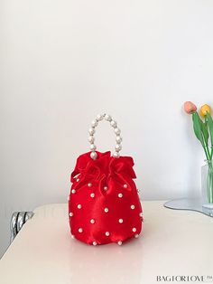 BagForLove - Compact Chic Pearl-Embellished Bucket Bag Product Description Color Red Details Pearls Type Bucket Bag Bag Size Mini Style Glamorous Closure Type Drawstring Pattern Type Plain Strap Type Ring Features Lightweight Composition 100% Polyester Material Polyester Size Chart INCH CM Strap Length Bag Length Bag Width Bag Height Handle Height 43.3 inch 5.9 inch 5.9 inch 7.5 inch 5.9 inch Strap Length Bag Length Bag Width Bag Height Handle Height 110 cm 15 cm 15 cm 19 cm 15 cm Details Pictur Red Clutch Bag For Valentine's Day, Red Pouch Shoulder Bag For Valentine's Day, Handheld Red Shoulder Bag For Parties, Red Handheld Shoulder Bag For Party, Red Pouch Shoulder Bag For Party, Bucket-shaped Evening Bag As A Gift, Red Evening Bag Suitable As Gift, Red Evening Gift Bag, Red Gift Bag For Evening