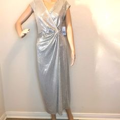 This Incredible Dress Is 92% Nylon, 4% Metallic And 4% Spandex. Armpit To Armpit Measures 19”. Shoulder To Hem Is 51”. It Has Cap Sleeves. New With Tags. Sparkling Gown, John Meyer, Cap Sleeves, Prom Dresses, Prom, Sparkle, The Incredibles, Spandex, Womens Dresses