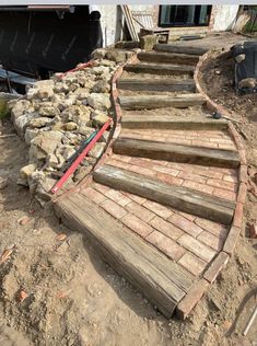 some steps made out of bricks and wood