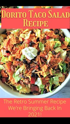 a white bowl filled with lettuce, black beans and taco salad recipe