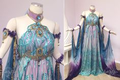 We created this gown for our customer Elizabeth to wear to the Labyrinth Masquerade Ball! Intricate sequin mesh overlays purple silk. The collar and under bust belt are decorated with teal jewels a... Gaun Abad Pertengahan, Mode Chanel, Fantasy Dresses, Fantasy Gowns, Fairy Dress, Fantasy Clothing