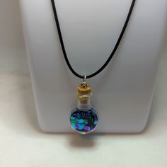 This Is A Tiny Glass Vial Filled With Purple, Green, And Aqua Glitter. Necklace Is Approximately 17-19". On Vegan Cord. Iridescent Adjustable Necklace For Party, Purple Glitter Party Jewelry, Glitter Necklace, Vial Necklace, Pick Your Poison, Night Swimming, Glass Vials, Hand Crafted Jewelry, Crafted Jewelry