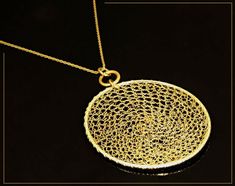 Long Gold Necklace, Big Statement Handmade Pendant, Large and Light Weighted Oval Pendant Statement and beautiful boho long necklace with large, but very light-weight pendant. Wear this gold statement necklace and feels like an empress yourself. This unique, oval crocheted pendant necklace is a statement piece with an impressive presence, to complete your outfit and to be special. The large pendant is very light.  The chances you see anyone else wearing your long statement necklace are almost nonexistent... Measurements:  Pendant size:  1.9 inches width 3.9 inches height Chain length:  27 inches (70 cm) 🖤Care instructions: I use the best and highest-quality materials for creating my jewelry, however, for keeping in the long run, I recommend avoiding contact with pool water, seawater, and Gold Oval Bohemian Necklace, Bohemian Yellow Gold Necklace With Large Pendant, Long Gold Necklace, Unique Gold Rings, Long Necklace Boho, Necklace Big, Long Statement Necklace, Long Silver Necklace, Silver Necklace Statement