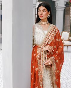 Brand: XENIA FormalsProduct Code: XFU-22-429 FLEURCollection: Hera Luxury Unstitched CollectionFabric: Chiffon DESIGN DETAILS: Embroidered Chiffon Front Right Panel 12 Inches Embroidered Chiffon Front Left Panel 12 Inches Embroidered Chiffon Side Panel 12 Inches Chiffon Back 36 Inches Embroidered Chiffon Sleeves 24 Inches Embroidered Organza Front & Back Patch Embroidered Organza Sleeves Patch -1 Embroidered Organza Sleeves Patch -2 Embroidered Chiffon Dupatta 2.65 Yards Rawsilk Trouser 2.50 Yar Chiffon Dupatta With Dabka Work For Reception, Formal Chiffon Set With Dupatta, Elegant Dabka Saree For Reception, Elegant Traditional Wear With Dupatta In Chiffon, Elegant Traditional Wear With Chiffon Dupatta, Semi-stitched Chiffon Dupatta For Reception, Elegant Georgette Saree With Dabka, White Chiffon Wedding Sets, Unstitched Chiffon Dupatta