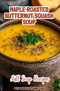 a bowl filled with soup next to sliced apples and parsley on the side text reads maple roasted butternut squash soup