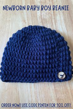 Newborn navy blue crocheted beanie with secured brown button on left side. Discount code PINTEN for 10% off! Blue Handmade Hat As Gift, Handmade Blue Hat For Gift, Handmade Blue Hat As Gift, Handmade Blue Hats As Gifts, Handmade Blue Beanie One Size Fits Most, Blue Handmade One-size Beanie, Handmade Blue One-size Beanie, Blue Handmade Beanie One Size, Handmade Blue Beanie One Size