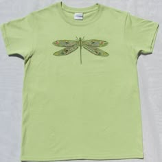 Nwot Green T-Shirt With A Super Beautiful Dragonfly With Intricate Designs On Its Wings. 100% Cotton Preshrunk. Measurements: Armpit To Armpit 35 In. Length 23 1/2 In. Width At Bottom 18 In. Beautiful Dragonfly, Nature Shirts, Small Boho, Green T Shirt, Hippie Festival, White Halter Maxi Dress, Bohemian Hippie, Green Tshirt, New Green