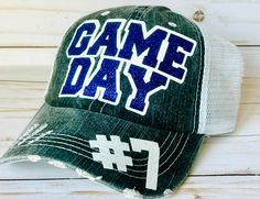 Celebrate your team spirit with this great Game Day trucker hat! You get to choose the hat (front is white) and glitter vinyl color. These are made with a premium grade glitter vinyl and trucker hat. Perfect for those spring and summer sport days to keep the sun out of your face. Group rates are available, send me a convo for more info. If no player number is listed, it will just say Game Day. Cheap Snapback Hats For Game Day, Cheap Trucker Hat For Sports Fans, Cheap Team Spirit Baseball Cap For Sports, White Sports Fan Hat For Game Day, White Sports Fan Baseball Cap For Game Day, Sporty White Hats For Game Day, Sporty Game Day Trucker Hat For Baseball Season, White Sporty Hat For Game Day, Sporty Game Day Trucker Hat For Baseball