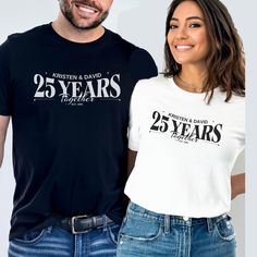 two people standing next to each other wearing t - shirts that say 25 years together