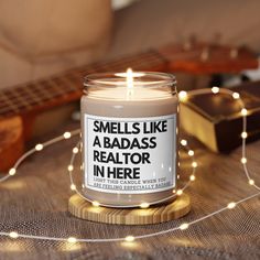 "Looking for the best realtor gift for your real estate agent? This Smells Like A Badass Realtor candle is for you!  Perfect for both men and women that work as a realtor selling homes! Makes a great birthday, Christmas, Valentine's Day, thank you gift, appreciation gift, graduation gift, Mother's Day, or Father's Day gift for anyone who works as a realtor. Packed with immersive aromas, these scented candles come in 9oz glass jars and are one size (2.8″ × 3.5\") (7.1cm × 8.8cm).  Made with 100% natural soy wax blend, each candle features a 100% cotton wick and a permanent adhesive label. .: Materials: 100% natural soy wax blend, 100% cotton wick and a glass jar .: One size: 2.8″ × 3.5\" (7.1cm × 8.9cm) .: Burning time: 50-60 hours .: Glossy permanent adhesive label .: Choose from five diff Realtor Valentines Day, Realtor Catch Phrases, Real Estate Candle, Gifts For Real Estate Agent, Real Estate Tumbler, Home Buyer Gifts From Realtor, Realtor Gifts From Buyer, Real Estate Agent Gifts, Real Estate Party Ideas