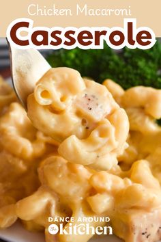 chicken macaroni casserole on a white plate with broccoli in the background