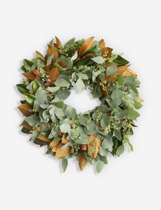 a wreath with green leaves on it