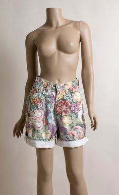 FREE DOMESTIC SHIPPING! <3♥ Lovely vintage 1980s floral print jean shorts! ♥ Metal zipper and button fly. Board short length, great for folding up or wearing straight!♥ Pretty flower garden print in pastel shades of pinks, greens, purples, yellows and white! ♥ In great condition! Zena tag. * measurements *Waist - 26"Hips - 40"Inseam- 7.5"Rise in the back - 15"Length - 19"Fits like a small.** I do ship worldwide!For more vintage cuteness, check out my store:→ http://zwzzy.etsy.com ←❀ Instagram Pretty Flower Garden, Pastel Flower Garden, Floor Length Maxi Skirt, Vintage Dresses 1960s, 1960's Dress, Shorts Style, Pretty Flower, Garden Print, Ribbed Knit Dress