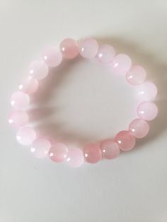 Selling bracelets 3-5$ Small bussines !! Follow my tiktok its dannaxplays Pink Rose Quartz Round Bracelet, Pink Rose Quartz Round Beaded Bracelets, Pink Rose Quartz Stretch Bracelet, Pink Rose Quartz Round Stretch Bracelet, Casual Pink Crystal Bracelet Gift, Casual Rose Quartz Bracelets For Gifts, Casual Pink Rose Quartz Jewelry, Casual Adjustable Rose Quartz Bracelets, Adjustable Pink Rose Quartz Stretch Bracelet