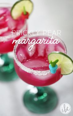 two margarita cocktails with lime slices on top and the words, prickly pear margarita