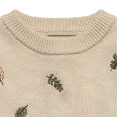 Treat your little one to warmth and style with our embroidered baby sweater! Made from super soft viscose sweater knit, this cozy piece provides comfy warmth for cooler days. Flexible ribbing at the neckline, cuffs, and hem ensures an easy fit for active little ones. With its thick feel, this sweater is perfect for fall and winter wear, keeping your baby cozy no matter the weather. Easy to layer over outfits for extra warmth, this sweater is a versatile essential for your baby's wardrobe. Our essentials have been independently certified with STANDARD 100 by OEKO-TEX® so that you don’t have to worry about harmful substances in your little one’s wardrobe. Pack includes one sweater. | Modern Moments™ by Gerber Baby Neutral Light Beige Embroidered Leaves Sweater - 24Mo Embroidered Baby Sweater, Baby Boy Sweater, Embroidered Leaves, Embroidery Sweater, Gerber Baby, Baby Sweater, Embroidered Sweater, Neutral Baby, Baby Sweaters