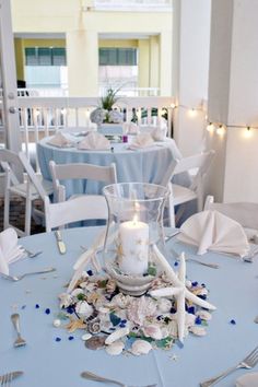 the table is set up for a wedding reception