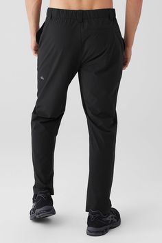 Change of plans? No need to change the fit. Take the Co-Op Cropped Tech Trouser from gym to street or day to night — with street-ready details like a button and zip-fly closure, elevated seams, belt loops for a secure fit, and a bottom tapper for an elevated finish. A cropped fit is clutch for showing off your sneaker game. Street-ready & tech-equipped tailored trouser pant Secure, invisible zippered pockets Designed & uniquely fit for every size Wear-tested by our in-house team for the perfect Casual Moisture-wicking Bottoms By Alo Yoga, Alo Yoga Moisture-wicking Casual Bottoms, Casual Alo Yoga Bottoms For Gym, Casual Alo Yoga Gym Bottoms, Functional 4-way Stretch Alo Yoga Bottoms, Sports Pants With Zip Fly In Black, Versatile Black Go-dry Pants, Alo Yoga Relaxed Fit Sports Bottoms, Sporty Alo Yoga Gym Bottoms