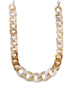 Fashion link necklace in beige and gold.  It is designed with light brown beige acrylic links with a white tone in them to give a marble look, and polished gold tone acrylic links.  A beautiful light color beige and gold statement necklace that is light weight around your neckline but a big look.  Works great as a casual or dressy set for everyday or any special occasion.  Necklace length is approximately 15 inches with a 2.5 inch extender The beige links are acrylic   They are 1.14 inches x .83 inches long. The gold links are acrylic with a shiny polished gold plated finish.  They are .87 inches x .64 inches Lobster claw closure. Marble Finish, Beige Marble, White Tone, Gold Statement Necklace, Working Woman, Gold Fashion, Link Necklace, Brown Beige, Necklace Length