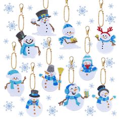 six snowman key chains with different designs on them