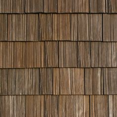 a close up view of wood shingles on a roof