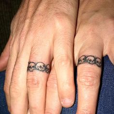 two people with matching rings on their fingers