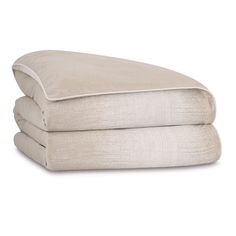 two pillows stacked on top of each other