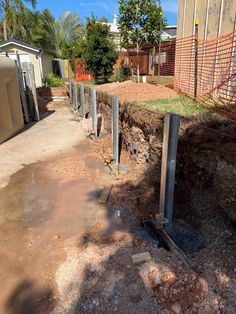 a concrete slab is being built into the side of a house