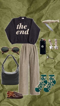 an assortment of clothing and accessories on a green background