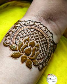 henna tattoo on the arm