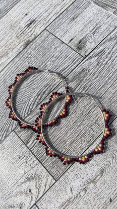 Hand beaded earrings Elegant Hoop Earrings With Colorful Beads, Round Beaded Chain Earrings Gift, Round Beaded Chain Earrings For Gift, Red Beaded Hoop Jewelry, Silver Beaded Round Hoop Earrings, Silver Beaded Circular Jewelry, Silver Circular Beaded Jewelry, Silver Hoop Beaded Jewelry, Silver Beaded Hoop Jewelry