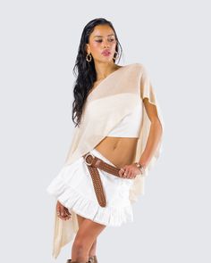 Free flowin’ ✨ Bring a vibe that no one can replace in this full four-piece boho set pairing an ivory off-shoulder poncho with a white jersey strapless top, an ivory ruffle mini skirt, and a tan braided belt 🤍 Summer Beige Poncho For Vacation, Chic Spring Poncho For Vacation, Chic Beige Poncho For Spring, Bohemian Off-white Sets For Festivals, White Bohemian Mini Skirt, Beige Bohemian Mini Skirt, Beige Ruffle Hem Mini Skirt, Bohemian White Mini Skirt With Lace Trim, Summer Poncho