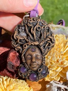 "This handmade, unique talisman is representing the tree of wisdom,tree of knowledge, &the wisdom of Sophia. Her amethyst are for protection, purification, and divine connection. The chakras associated with this talisman or third eye, crown and the etheric. The element of amethyst is wind. The roots of mind are symbolic while wrapping around the \"3\"nuggets. Three represents the All, the triad, the beginning,middle and the end, the unification of mind, body and spirit. Her owl is her totem for Handmade Mystical Purple Crystal Necklace, Handmade Mystical Amethyst Crystal Necklace, Handmade Mystical Amethyst Crystal Necklaces, Handmade Amethyst Amulet Crystal Necklace, Handmade Spiritual Amethyst Crystal Necklace, Bohemian Crystal Necklaces With Charms As A Gift, Bohemian Hand Cast Necklace For Gift, Hand Cast Bohemian Necklace As Gift, Tree Of Wisdom