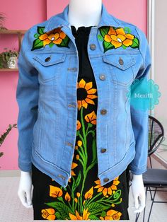 "Mexican floral embroidered jacket. Made out of a soft, durable denim, with comfortable stretch. Decorative button-flap faux pockets at chest. Side welt pockets in front. Size- Small Measurements: Bust- 33\" Length- 20\" 🧺Care Instructions: We recommend hand washing separately, hang to dry. 📸Additional photos can be provided upon request. 👗Always allow a little room and consider your own measurements before purchase to avoid any problems. If measurement are exact chances are the garments will Blue Embroidered Relaxed Fit Outerwear, Blue Embroidered Outerwear With Relaxed Fit, Embroidered Denim Outerwear With Relaxed Fit, Embroidered Relaxed Fit Denim Jacket, Relaxed Fit Embroidered Denim Outerwear, Fitted Denim Outerwear With Floral Embroidery, Embroidered Denim Jacket With Relaxed Fit, Embroidered Denim Jacket In Relaxed Fit, Blue Embroidered Cotton Denim Jacket