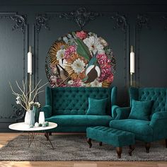 the living room is decorated in teal and gold tones, with an ornate wall hanging