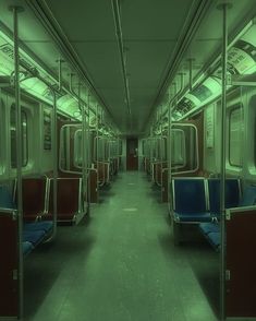 an empty subway car with blue seats and green lights on the ceiling, in a dark room