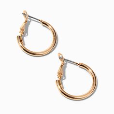 These trendy hollow tube hoop earrings are here to dress up your look or keep it casual chic. They will pair nicely with your other gold-tone accessories or you can mix them in with other finishes for a more eclectic style.Finish: Gold-tone Diameter: 20MM Closure: ClutchbackMaterial: Metal - Claire's Gold 20MM Tube Hoop Earrings Adjustable Clip-on Small Hoop Earrings, Tube Hoop Earrings, Fashionable Jewelry, Eclectic Style, Jewelry And Accessories, Jewelry Earrings Hoops, The Gold, Casual Chic, Jewelry Earrings